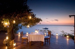 A dining table behind sea