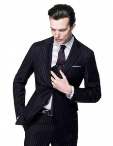 A male model in black suit