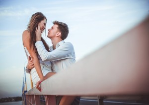 A man touching woman cheeck