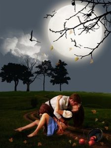 Couple kissing under trees