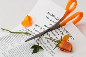 a marriage certificate and flower